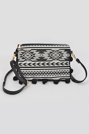 Tribal Inspired Clutch With Puff Balls Ridges